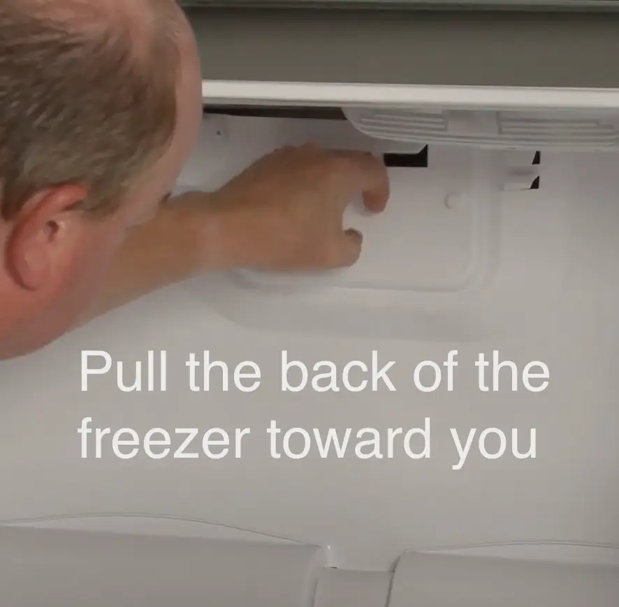 Image of pull the back of the freezer toward you